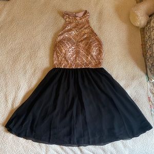 Speechless short rose and black dress. Sequin detailing and somewhat open back